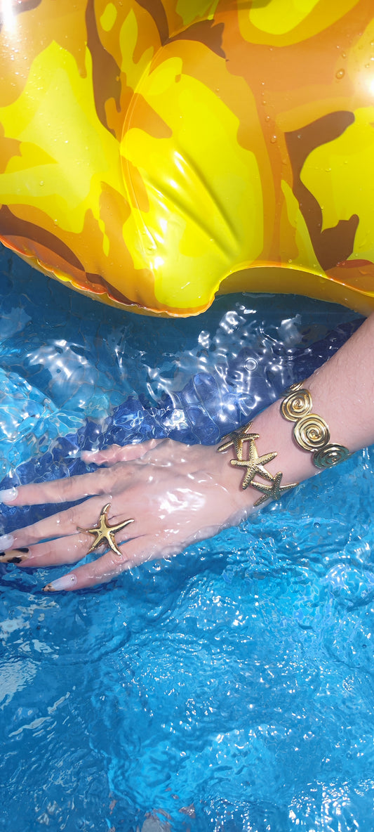 Brazalete rígido estrellas o twirls